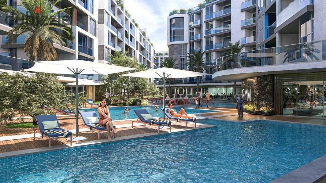 Apartment for sale in the Darvell Residence compound, October Gardens, on Al Wahat Road at an investment price with payment systems, your advance payment, your discount. — 1/8