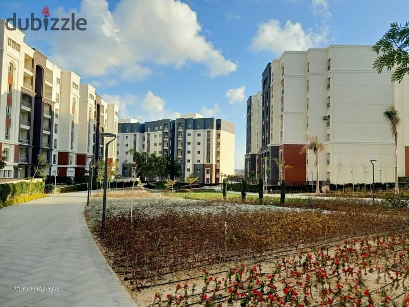 Apartment for sale in Alex West – 184 meters with a plaza view and near delivery — 1/8
