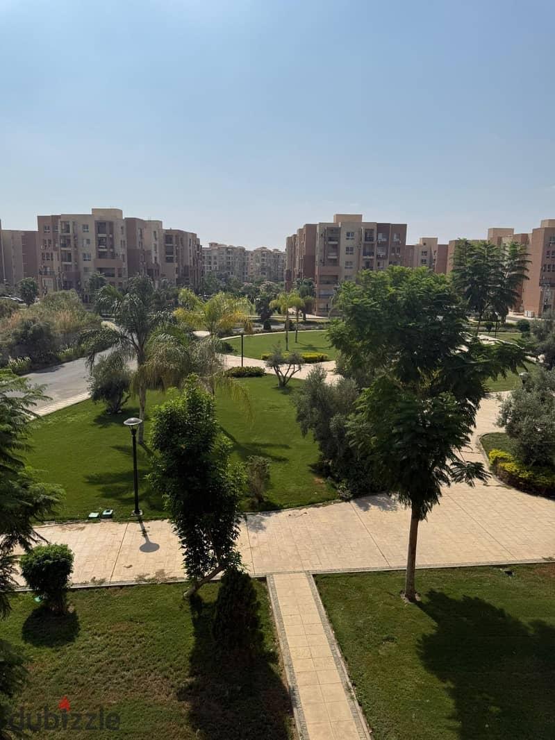 Apartment for sale, immediate delivery inside B8 in Madinaty with a wonderful view and divided into 4 rooms with a distinctive internal division and the possibility of creating a fifth room inside it. — 1/8