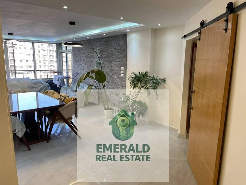 For rent, a super lux apartment in the Darna compound, with an open view of the large garden in front completely.