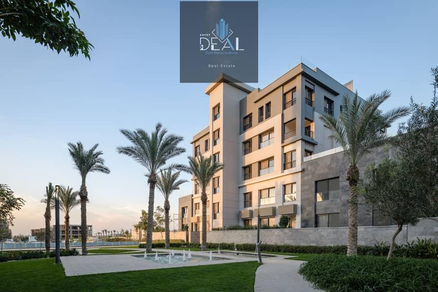Own your apartment in the heart of Fifth Settlement, close to AUC, Suez Road, and the Regional Ring Road, with a flexible 10-year payment plan! — 1/8
