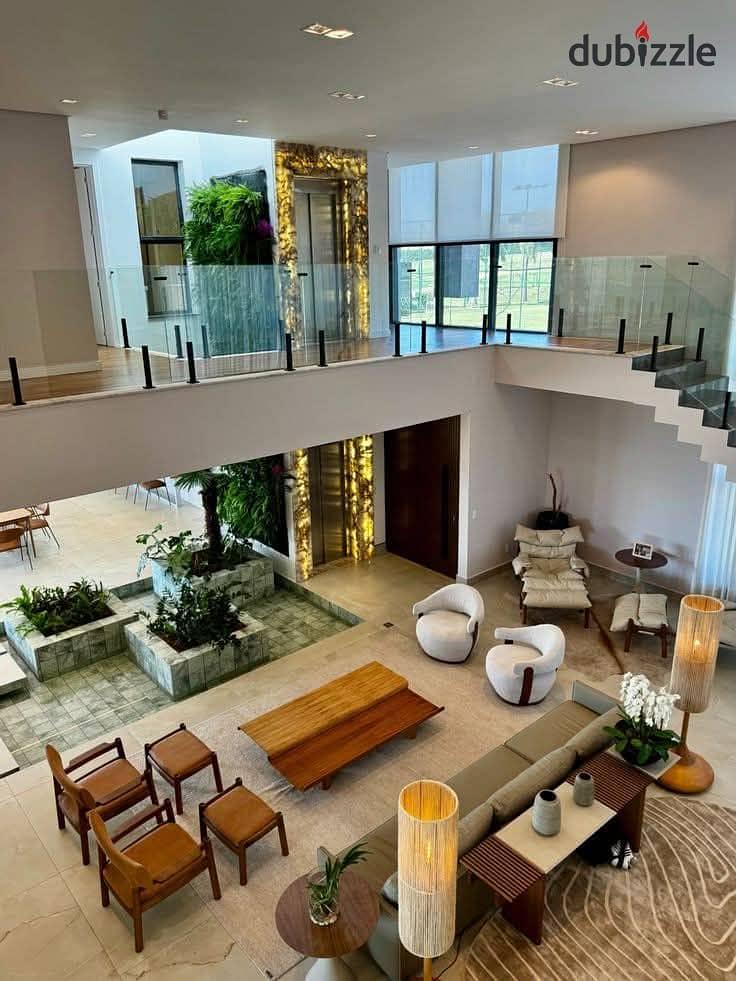 For those seeking upscale living, a villa is for sale in a prime location next to Madinaty minutes away from the American University, near Mivida — 1/8